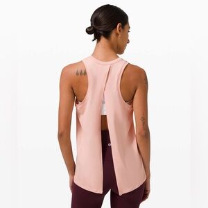 Lululemon All Tied Up Tank Top size 2 like new- 
 pink Mist